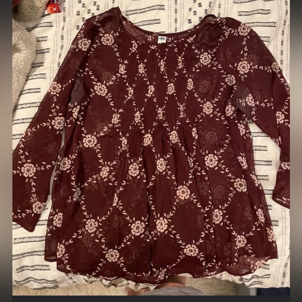 Flowy maroon blouse.